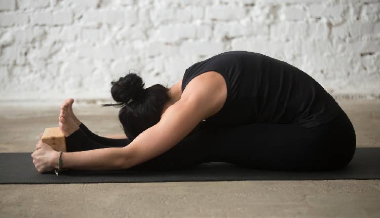 Paschimottanasana or Seated forward fold