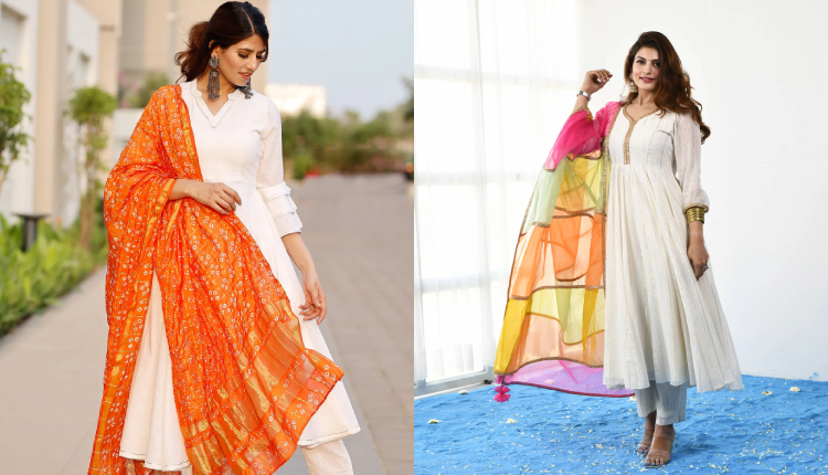 White suit with a vibrant dupatta